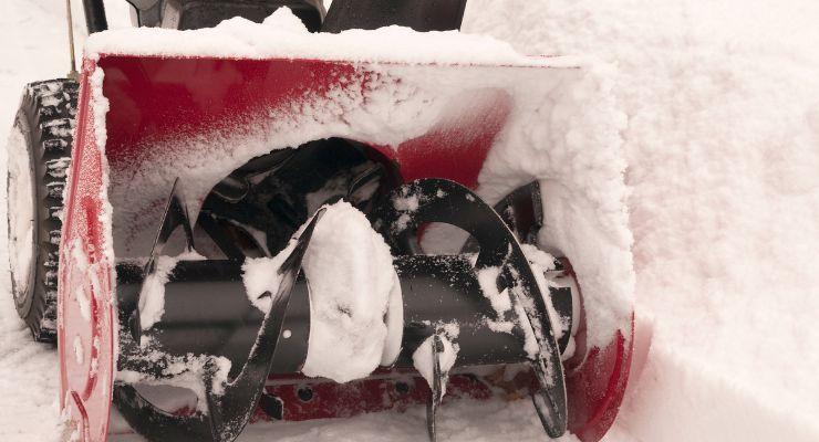 One of the Snow Blowing Tips: clearing the snow blowers auger