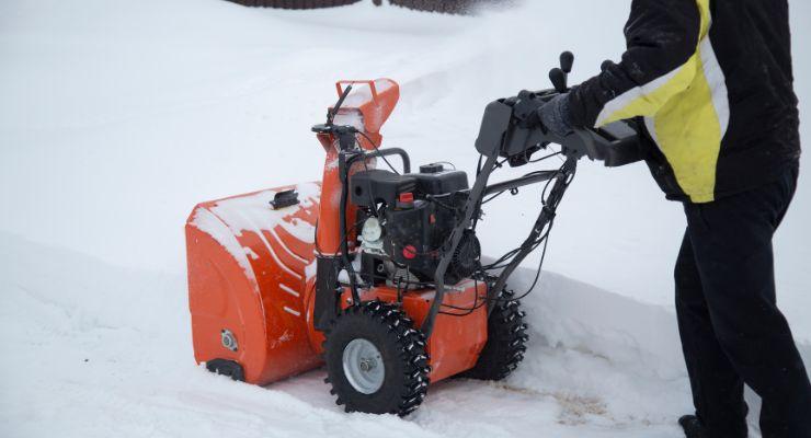 snow clearing with electric snow blower