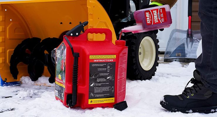 Adding stabilizer to snow blower's fuel tank